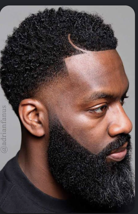 Beard shape-up with razor part in a fade