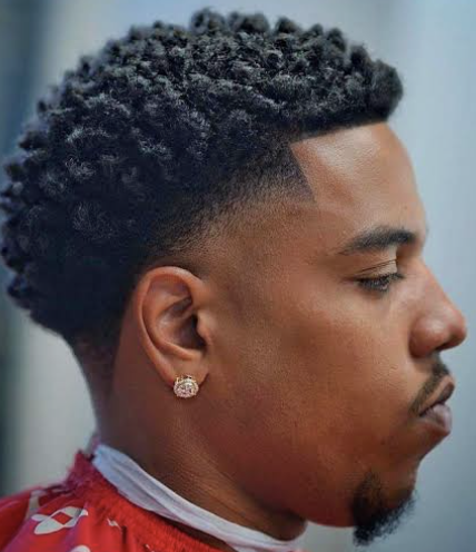 Curly sponge top with taper fade
