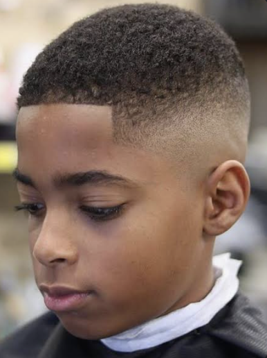 Clean buzz cut fade with sharp line-up
